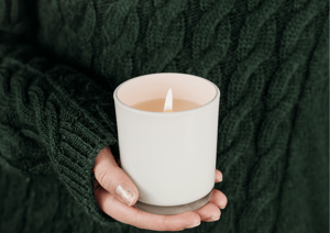 Hand holding a Candle Jar